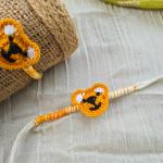 Orange teddy crochet rakhi
