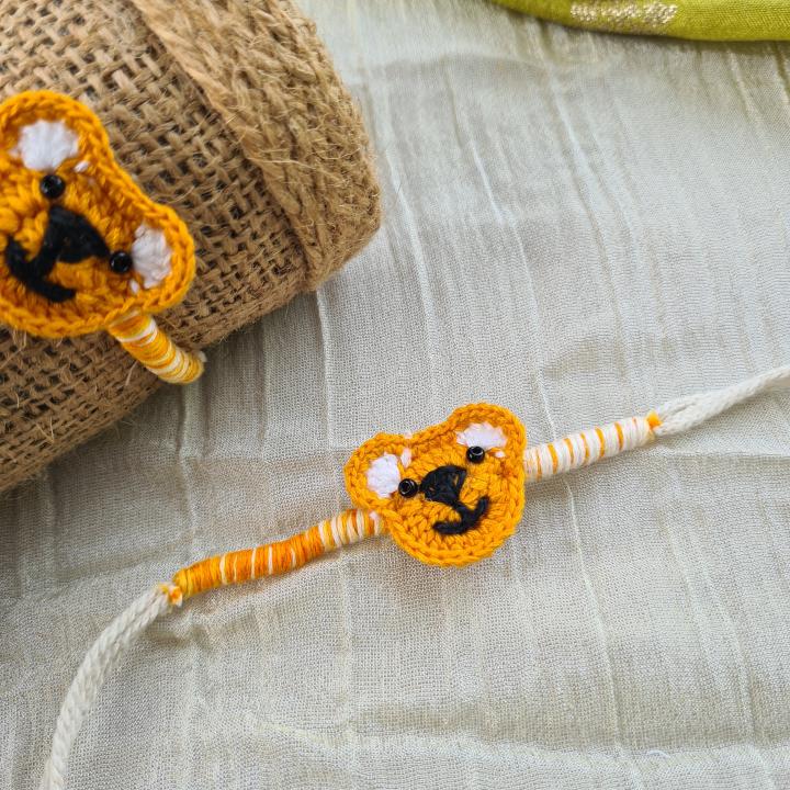 Orange teddy crochet rakhi