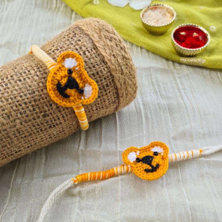 Orange teddy crochet rakhi