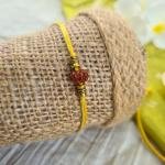 Minimal Yellow Rudraksh Rakhi