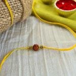 Minimal Yellow Rudraksh Rakhi