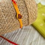 Red And Yellow Rudraksh Rakhi